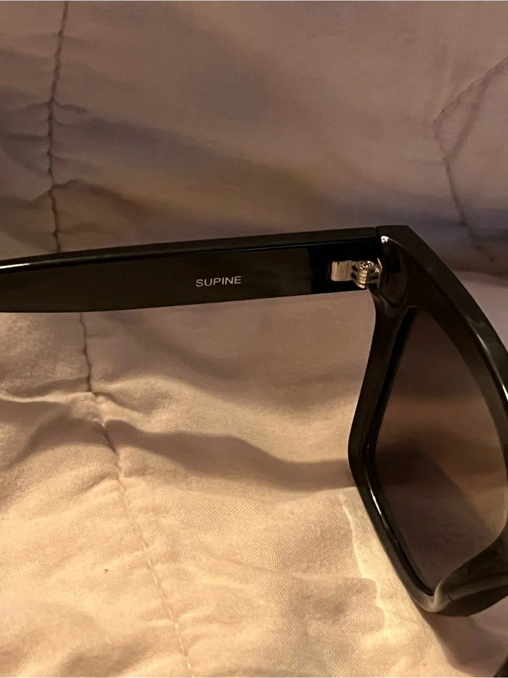 Quay Australia Supine polarized blue mirrored glasses.